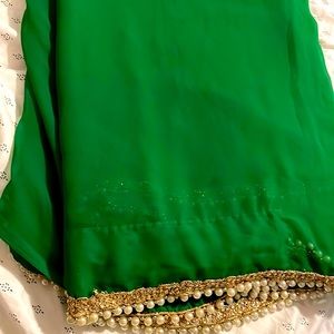 Pretty gerogette saree with pearls border